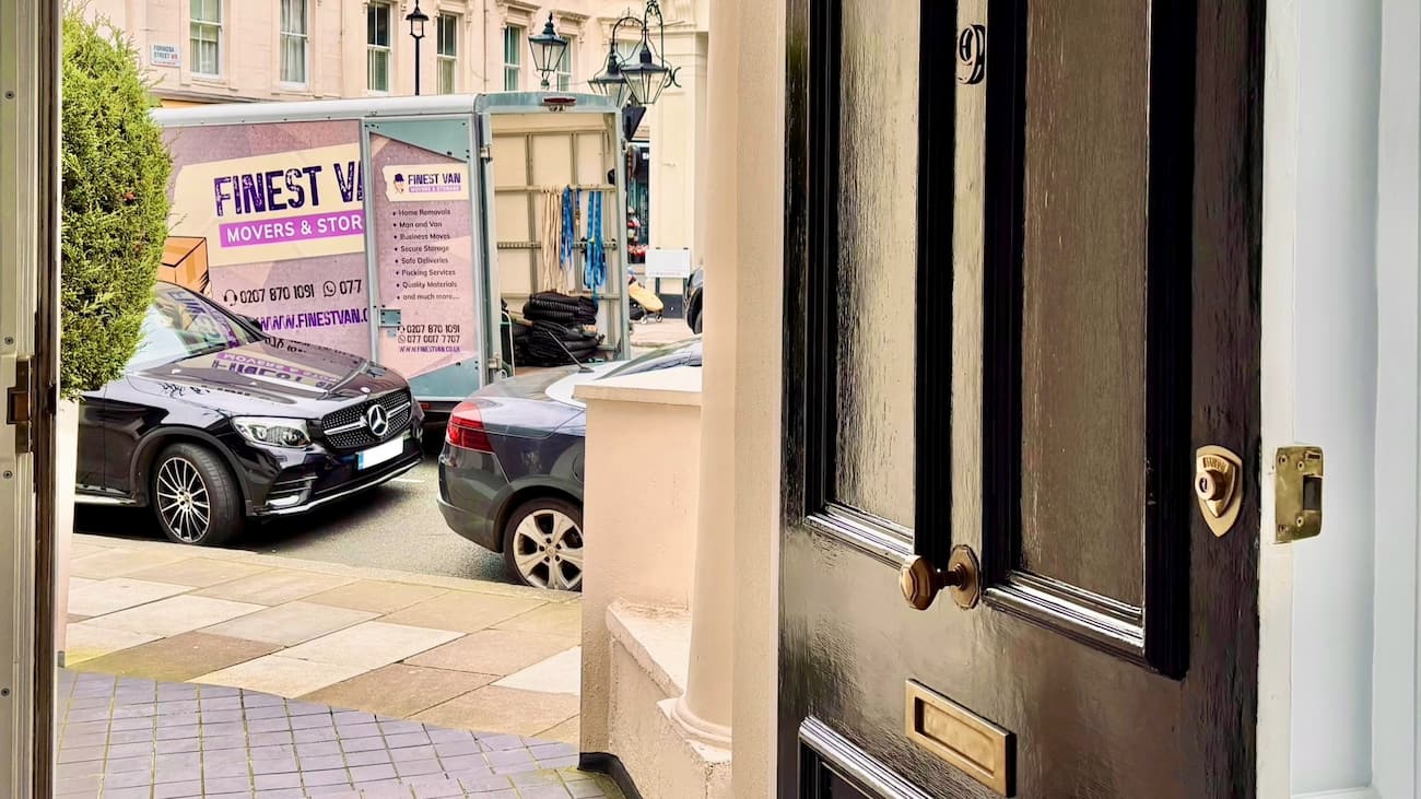 Finest Van removals van outside London home on moving day