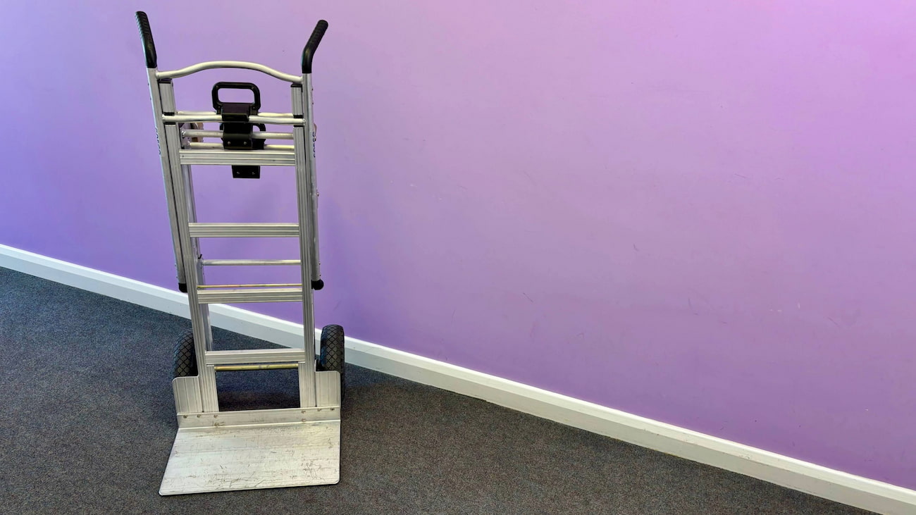 Removals trolley in an office corridor ready for a smooth office move