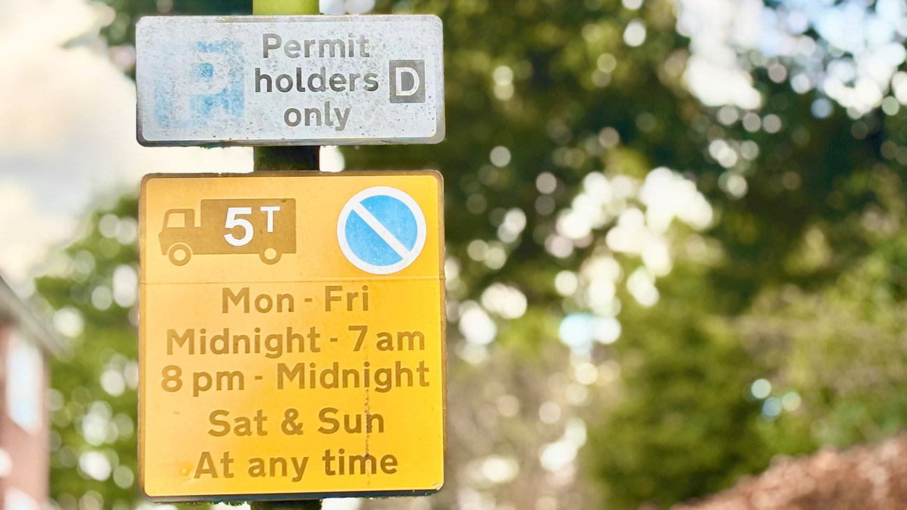 Permit holders only parking sign with time restrictions in London
