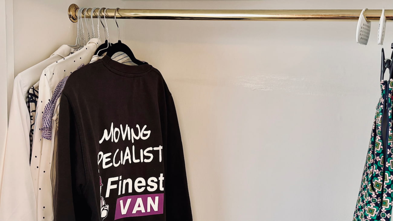 HangingClothingInWardrobe,FinestVan,London